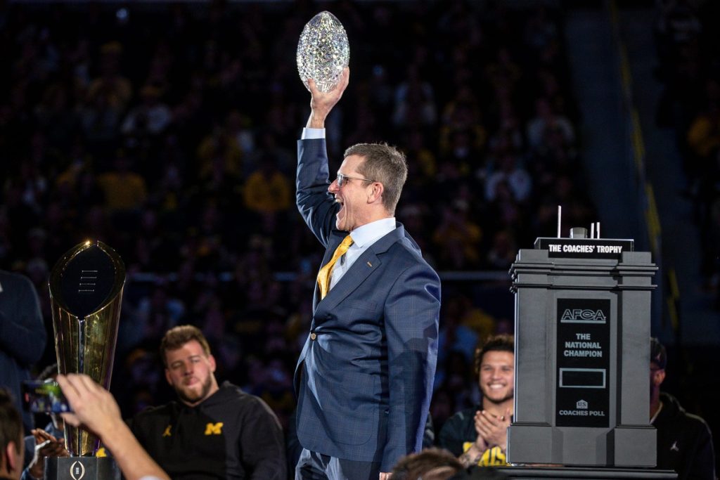 World reacts as NCAA drops hammer on Harbaugh for cheating