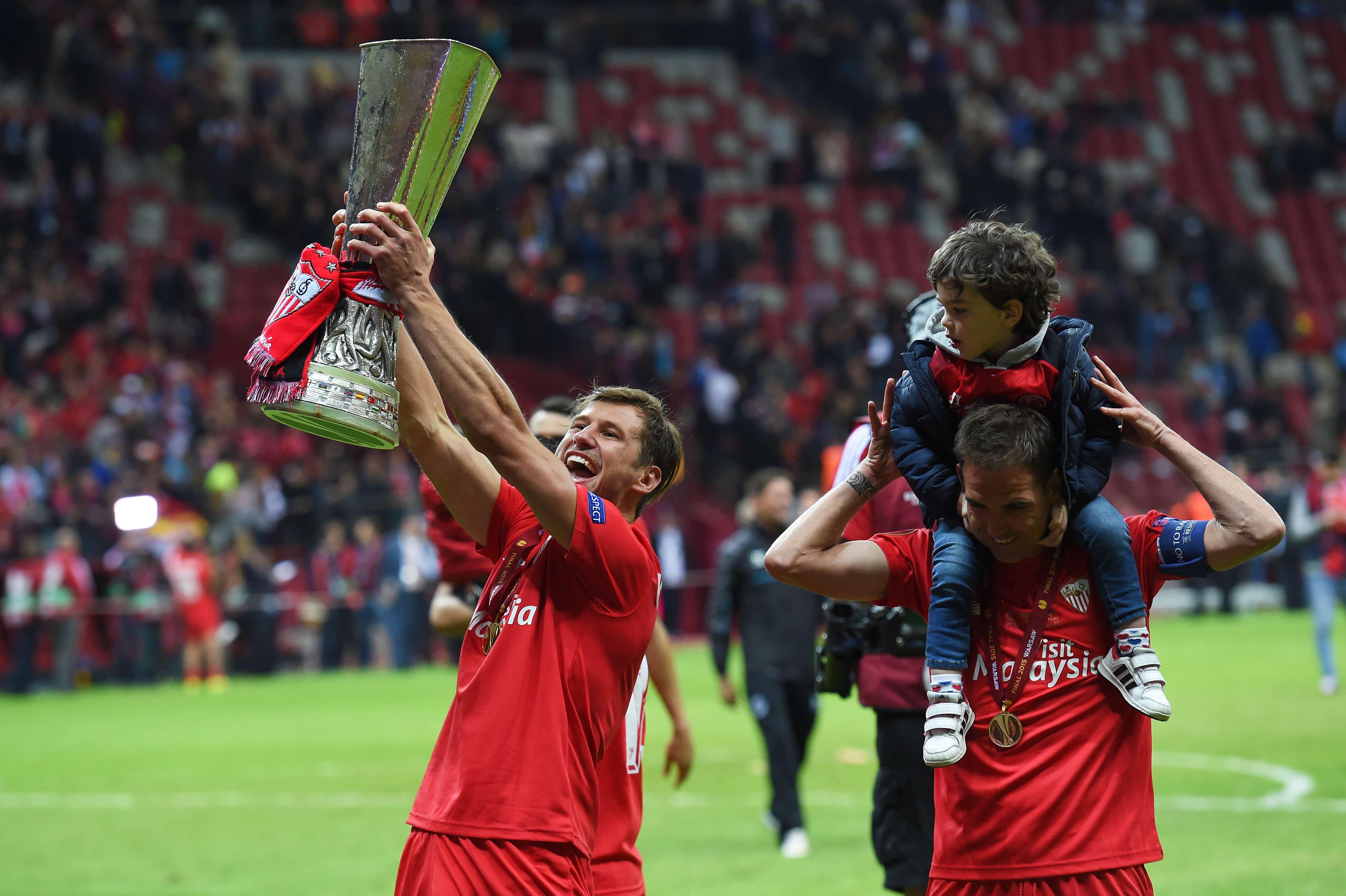 Sevilla FC's Grzegorz Krychowiak lifts the Europa League trophy