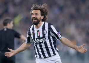 TURIN, ITALY - APRIL 10:  Andrea Pirlo of Juventus celebrates scoring the first goal during the UEFA Europa League quarter final match between Juventus and Olympique Lyonnais at Juventus Arena on April 10, 2014 in Turin, Italy.  (Photo by Claudio Villa/Getty Images)