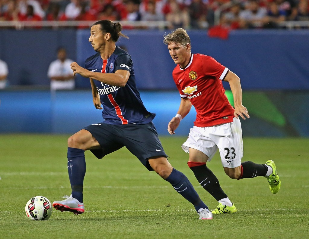 CHICAGO, IL - JULY 29: Zlatan Ibrahimovic #10 of Paris Saint-Germain is chase by Bastain Schweinsteiger #23 of Manchester United during a match in the 2015 International Champions Cup at Soldier Field on July 29, 2015 in Chicago, Illinois. (Photo by Jonathan Daniel/Getty Images)