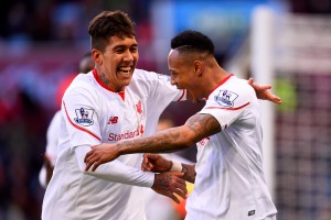 BIRMINGHAM, ENGLAND - FEBRUARY 14:  Nathaniel Clyne of Liverpool celebrates with team-mate Roberto Firmino after scoring his team's fifth goal during the Barclays Premier League match between Aston Villa and Liverpool at Villa Park on February 14, 2016 in Birmingham, England.  (Photo by Stu Forster/Getty Images)