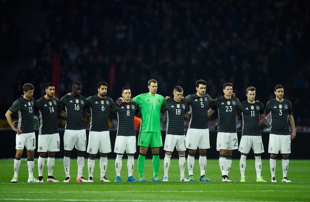 BERLIN, GERMANY - MARCH 26:  Germany players observe a minute of silence for the victims of Brussels terror attacks prior to the International Friendly match between Germany and England at Olympiastadion on March 26, 2016 in Berlin, Germany.  (Photo by Mike Hewitt/Getty Images)