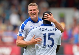 LONDON, ENGLAND - AUGUST 15:  Robert Huth and Jeff Schlupp of Leicester City celebrate their team's 2-1 win in the Barclays Premier League match between West Ham United and Leicester City at the Boleyn Ground on August 15, 2015 in London, United Kingdom.  (Photo by Justin Setterfield/Getty Images)