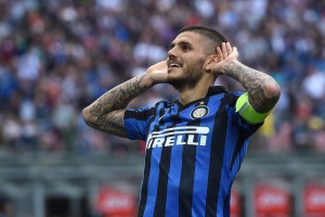 MILAN, ITALY - MAY 07:  Mauro Icardi of FC Internazionale Milano celebrates after scoring the opening goal during the Serie A match between FC Internazionale Milano and Empoli FC  at Stadio Giuseppe Meazza on May 7, 2016 in Milan, Italy.  (Photo by Valerio Pennicino/Getty Images)