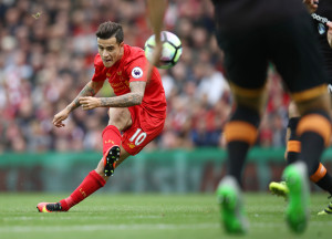LIVERPOOL, ENGLAND - SEPTEMBER 24: Philippe Coutinho of Liverpool scores their fourth goal during the Premier League match between Liverpool and Hull City at Anfield on September 24, 2016 in Liverpool, England. (Photo by Julian Finney/Getty Images)
