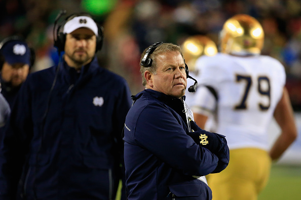 LANDOVER, MD - NOVEMBER 01: Head coach Brian Kelly of the Notre Dame Fighting Irish looks on from the sidelines during the first half against the Navy Midshipmen at FedExField on November 1, 2014 in Landover, Maryland.  (Photo by Rob Carr/Getty Images)
