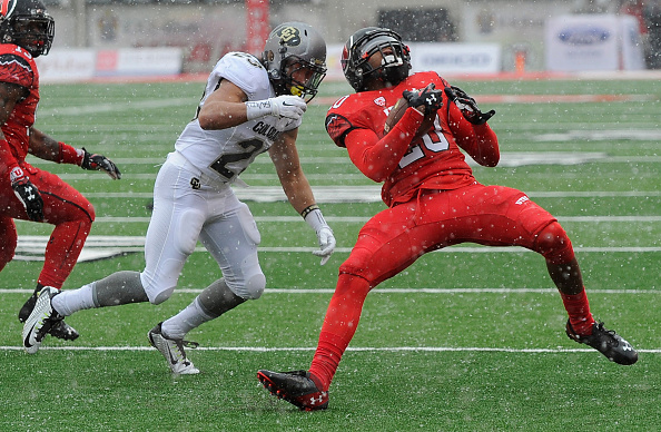 SALT LAKE CITY, UT - NOVEMBER 28: Free safety Marcus Williams #20 of the Utah Utes intercepts a pass in front tailback Phillip Lindsay #23 of the Colorado Buffaloes in the first quarter at Rice- Eccles Stadium on November 28, 2015 in Salt Lake City, Utah. (Photo by Gene Sweeney Jr/Getty Images)
