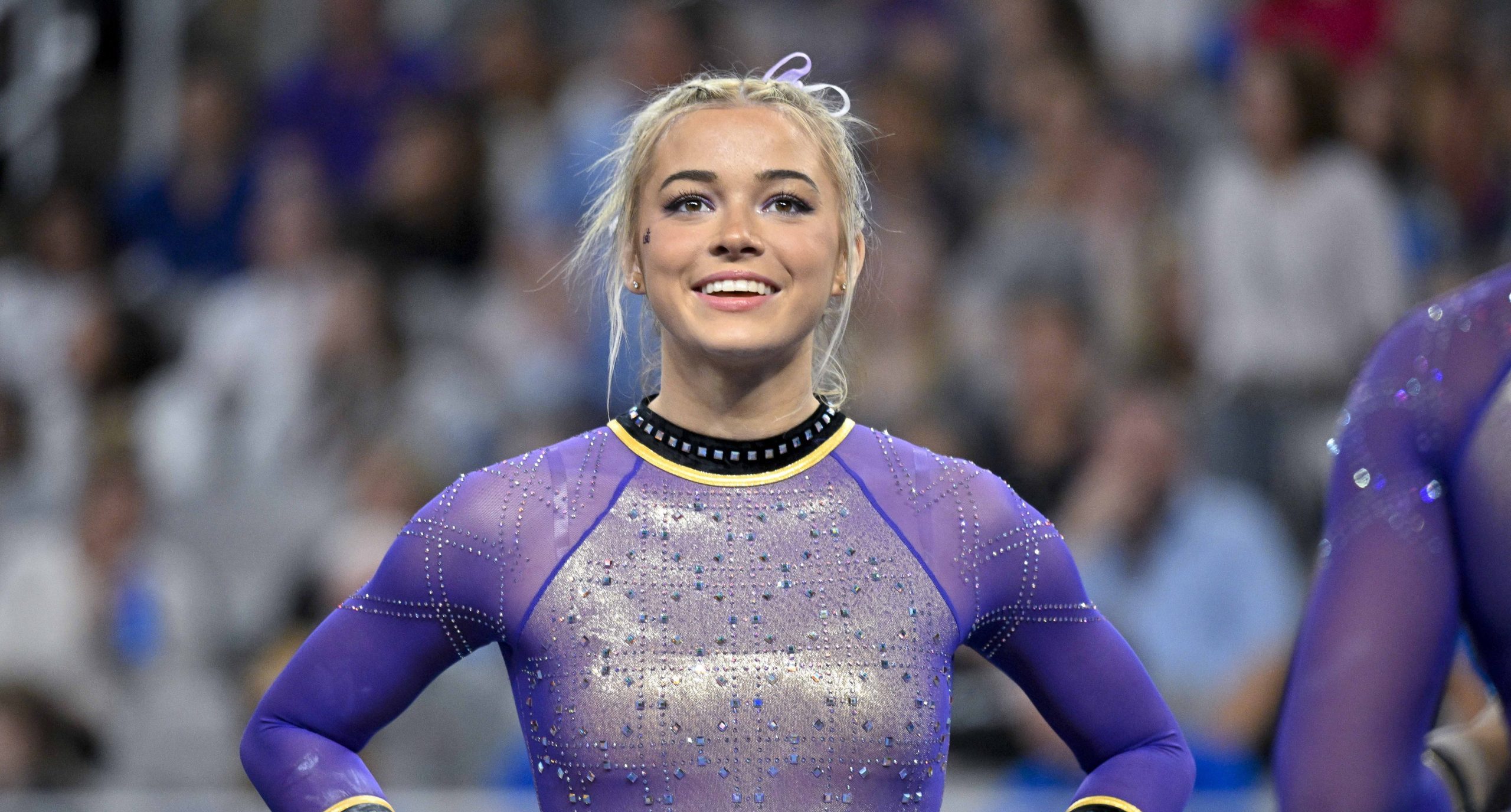 LSU Tigers gymnast Olivia Dunne warms up with her team on floor during the NCAA Women's National Gymnastics Tournament Championship at Dickies Arena.