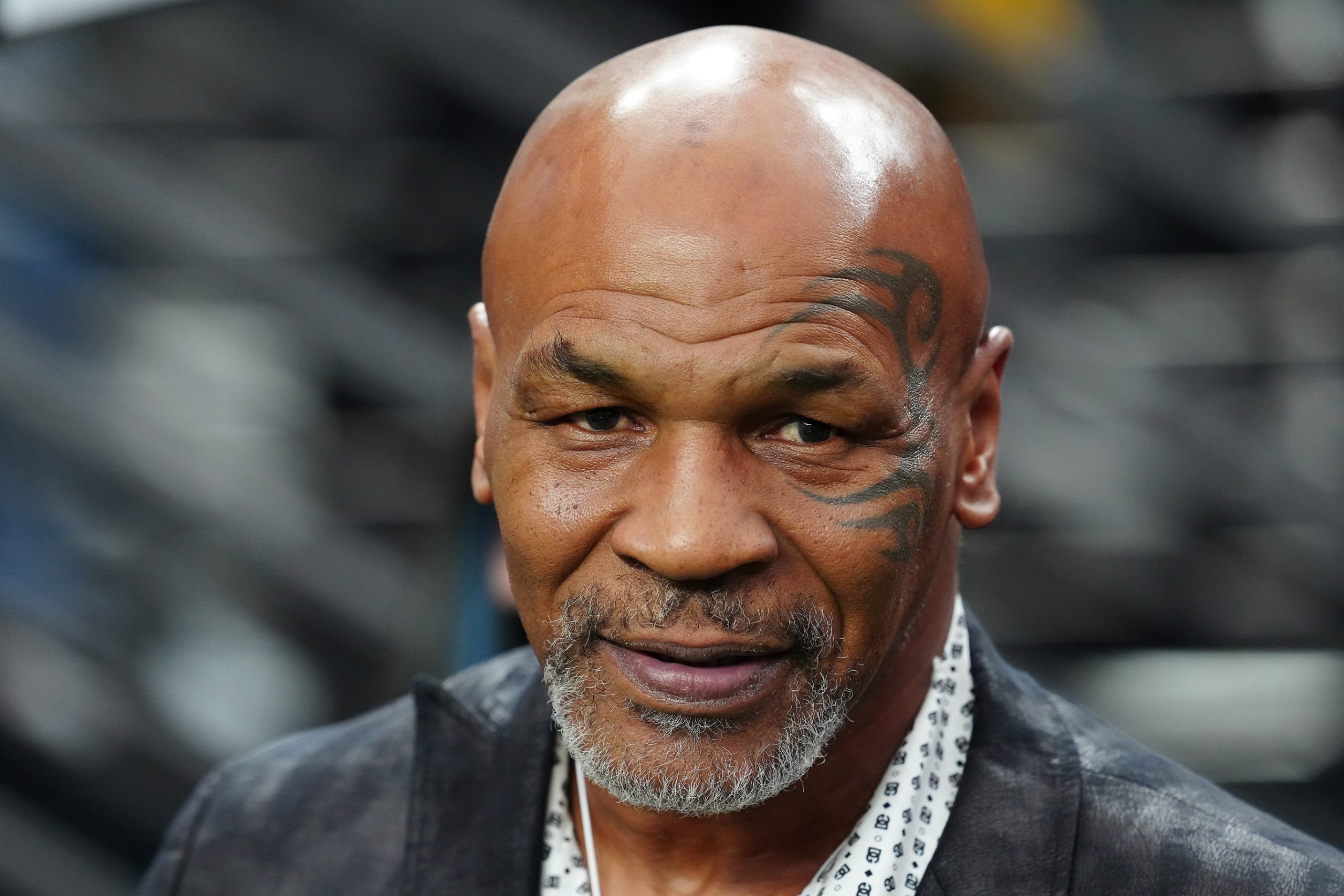 Sep 24, 2023; Paradise, Nevada, USA; Mike Tyson poses for a photo on the sidelines before the start of a game between the Las Vegas Raiders and the Pittsburgh Steelers at Allegiant Stadium. Mandatory Credit: Stephen R. Sylvanie-USA TODAY Sports