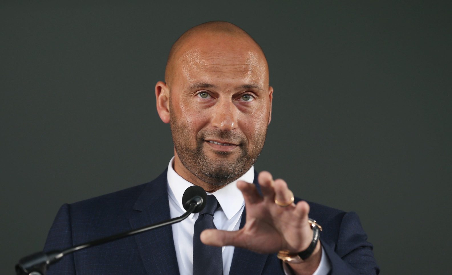 Derek Jeter waves to his children as he speaks to the crowd after he was inducted into the Baseball Hall of Fame in Cooperstown, New York Sept. 8, 2021. The former shortstop spent his entire 20 year career in pinstripes as a New York Yankee.