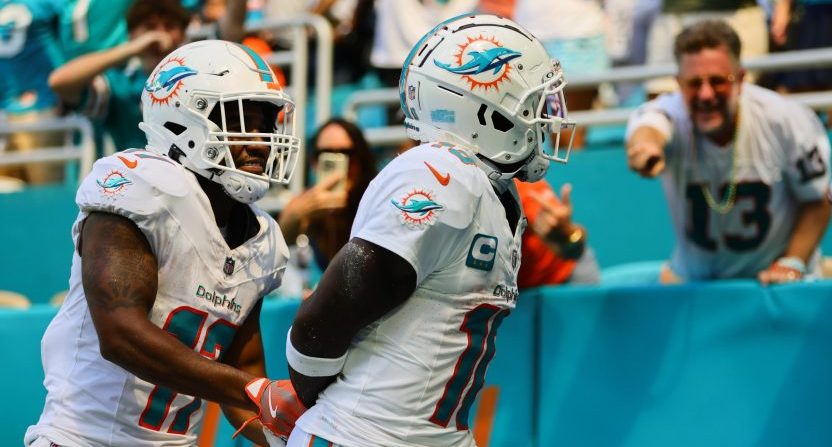 Sep 8, 2024; Miami Gardens, Florida, USA; Miami Dolphins wide receiver Tyreek Hill (10) celebrates with wide receiver Jaylen Waddle (17) after scoring a touchdown against the Jacksonville Jaguars during the third quarter at Hard Rock Stadium. Mandatory Credit: Sam Navarro-Imagn Images