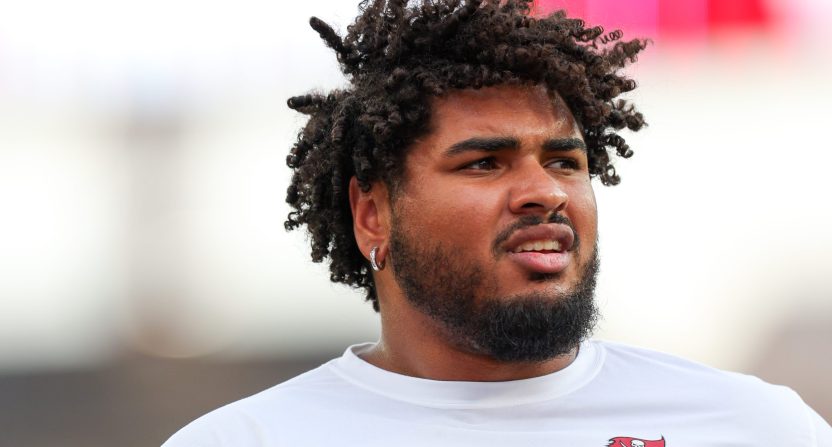 Tampa Bay Buccaneers offensive tackle Tristan Wirfs warms up on the field.