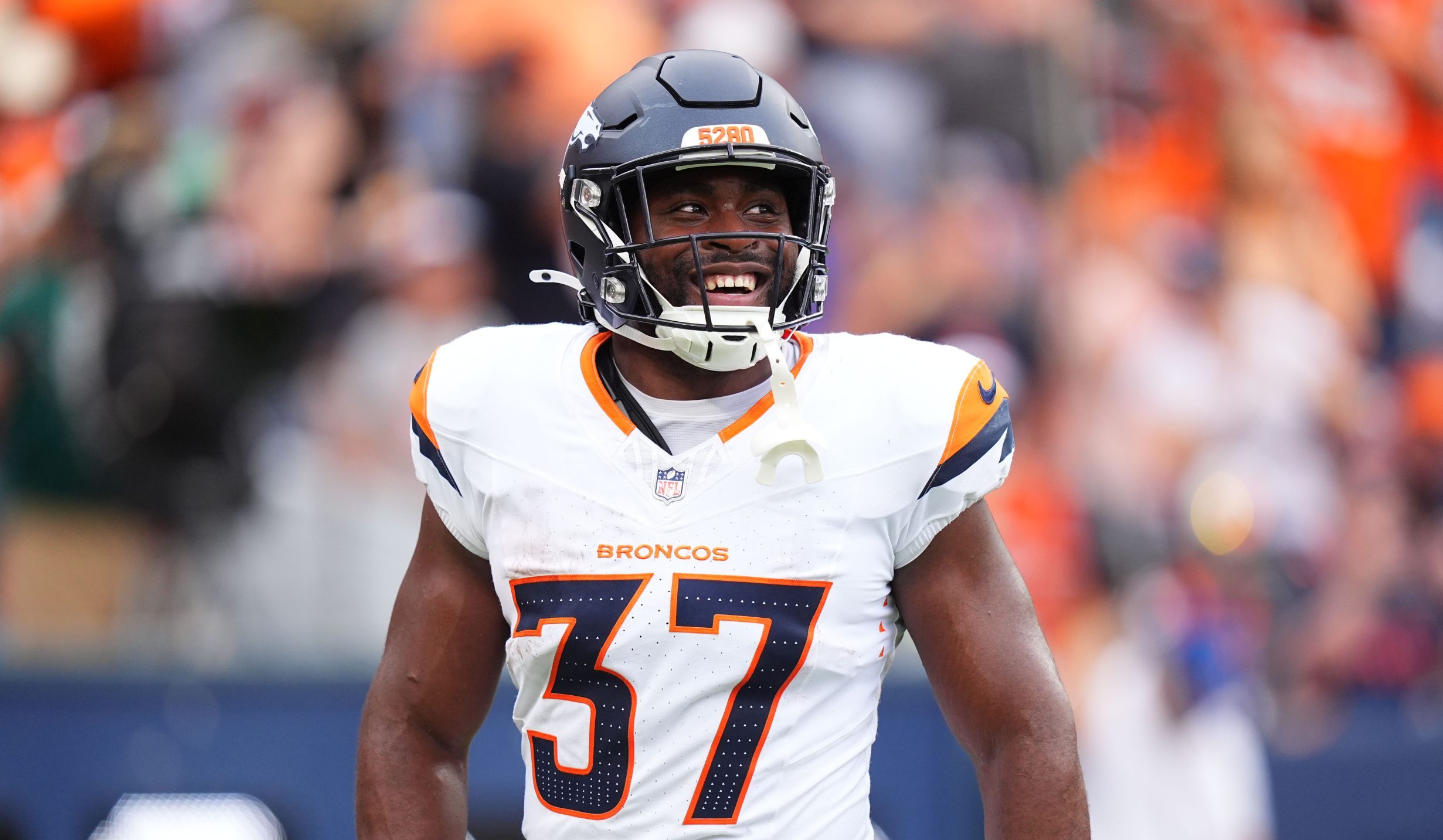 Denver Broncos running back Audric Estime on the field.