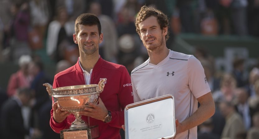 Tennis stars Novak Djokovic and Andy Murray hold trophies at the French Open.