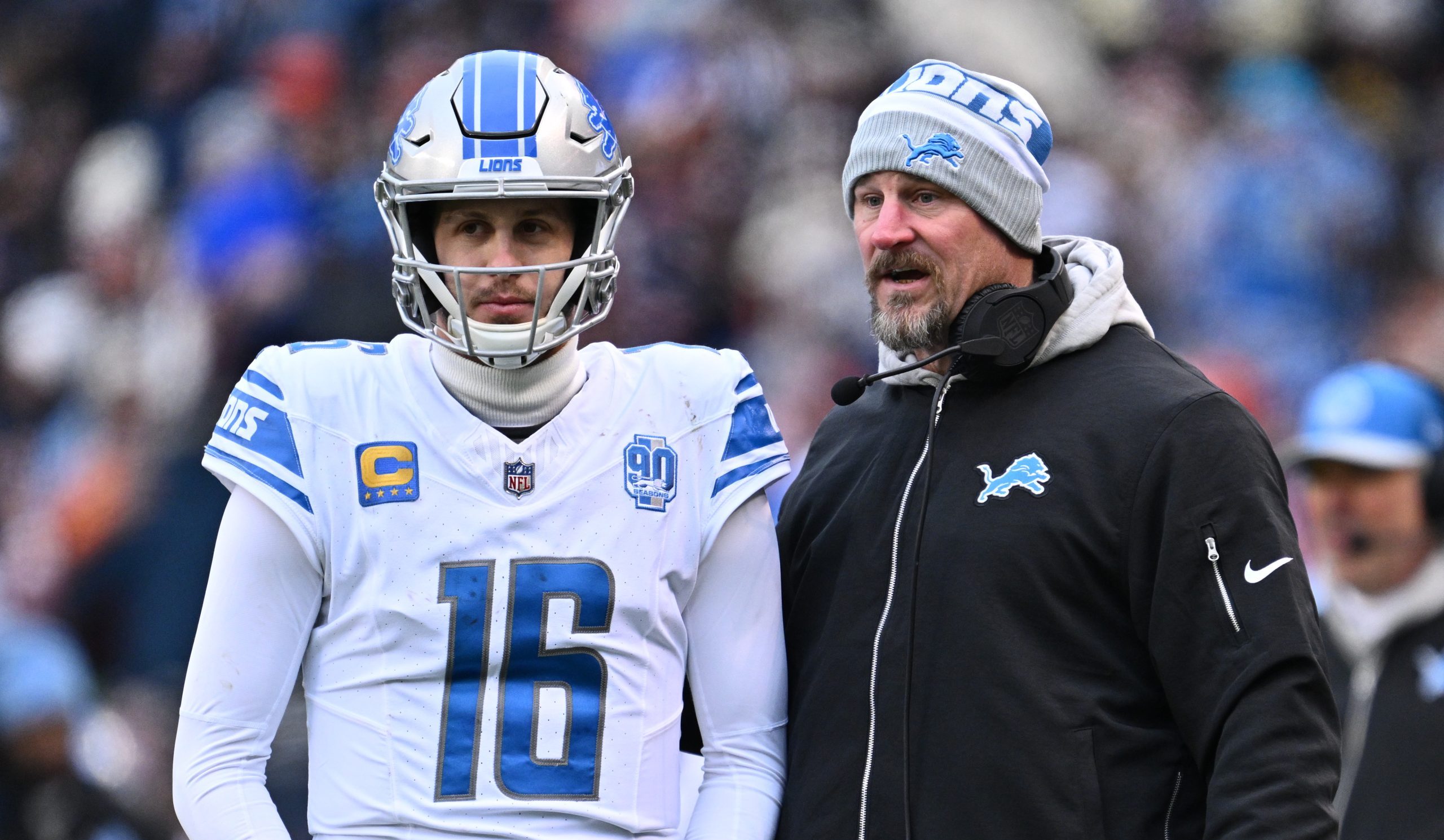 Detroit Lions quarterback Jared Goff and head coach Dan Campbell on the sideline.