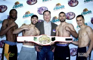 Boxcino semifinal fighters Chris Rudd, Miguel Gonzalez, Fernando Carcamo and Petr Petrov pose with 4 Bears Casino & Lodge General Manager Pat Packineau (middle) at Thursday's weigh-in; credit: Shane Sims, Banner Promotions 
