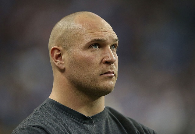 Brian Urlacher's hair is out there, and he's lovin' every minute of it