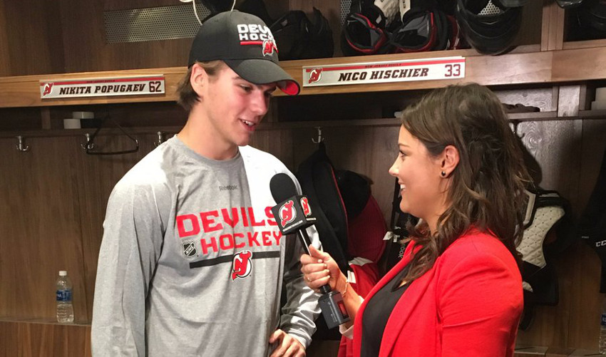 Amanda Stein interviews Nico Hischier during Devils' prospect camp.