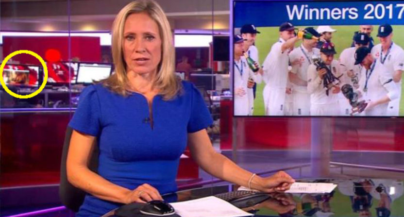 A monitor on-screen in the BBC newsroom showed a woman taking off her top.