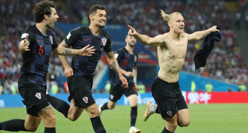 Croatia celebrating a World Cup win against Russia.