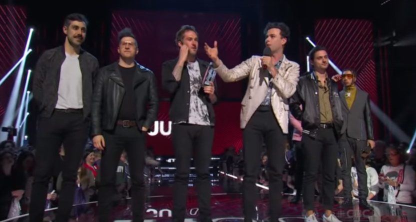 The Arkells claiming their Juno Group of the Year award.