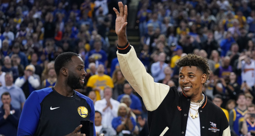 Nick Young (R) with Draymond Green in April 2019, when Young was given a NBA championship ring.