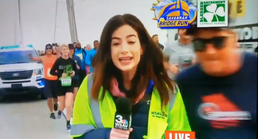 A Savannah reporter was slapped on the butt by a runner Saturday.