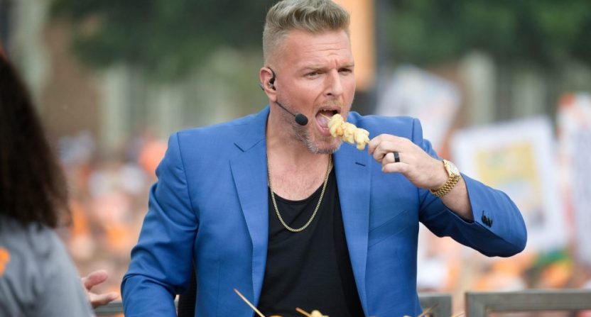Pat McAfee takes a bite to eat at the ESPN College GameDay stage
