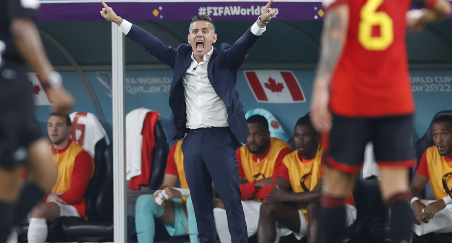 Canadian manager John Herdman yells during a match against Belgium on Nov. 23, 2022.