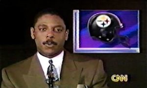 Fred Hickman working as a sports anchor for CNN.