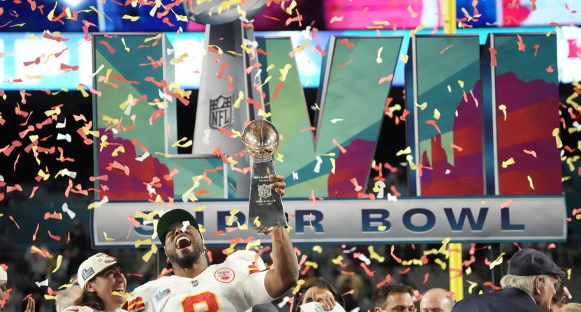 Carlos Dunlap (8) and the Chiefs celebrate a Super Bowl LVII win.