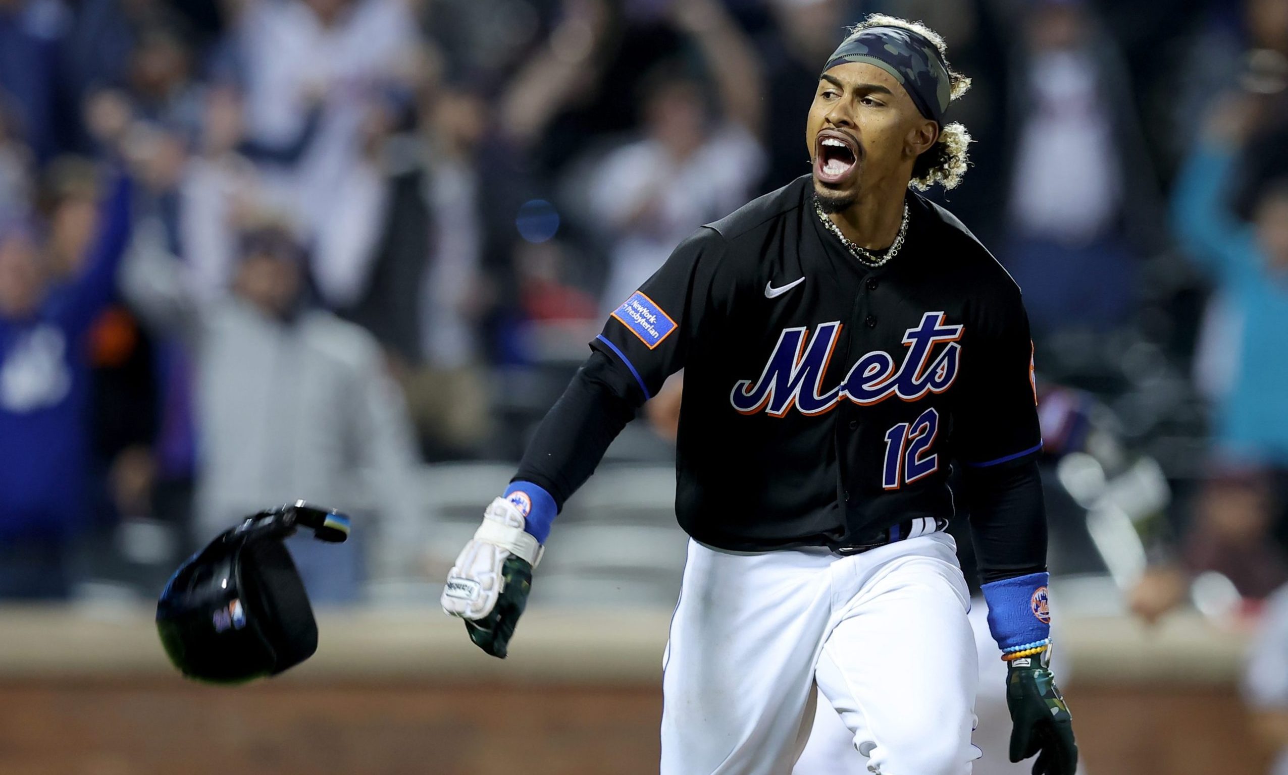 New York Mets shortstop Francisco Lindor (12) celebrates his walkoff RBI single against the Cleveland Guardians during the tenth inning at Citi Field