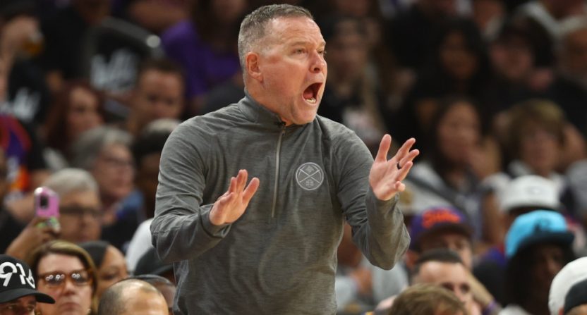 Denver Nuggets' coach Michael Malone coaching against the Phoenix Suns on May 7, 2023.