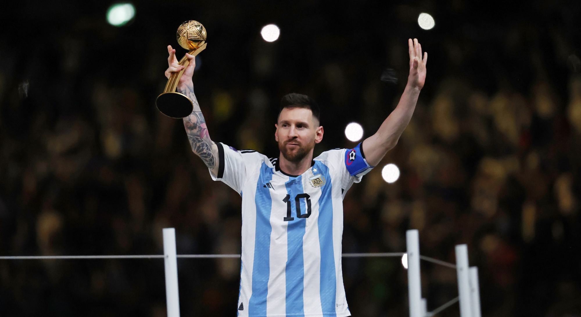 Lionel Messi celebrates winning the 2022 FIFA World Cup.