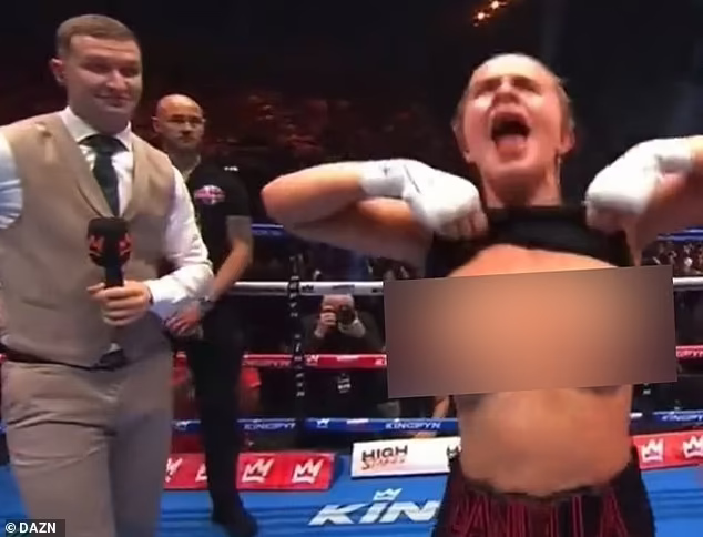 Kingpyn flasher apologizes (sort of) for baring breasts after boxing win 