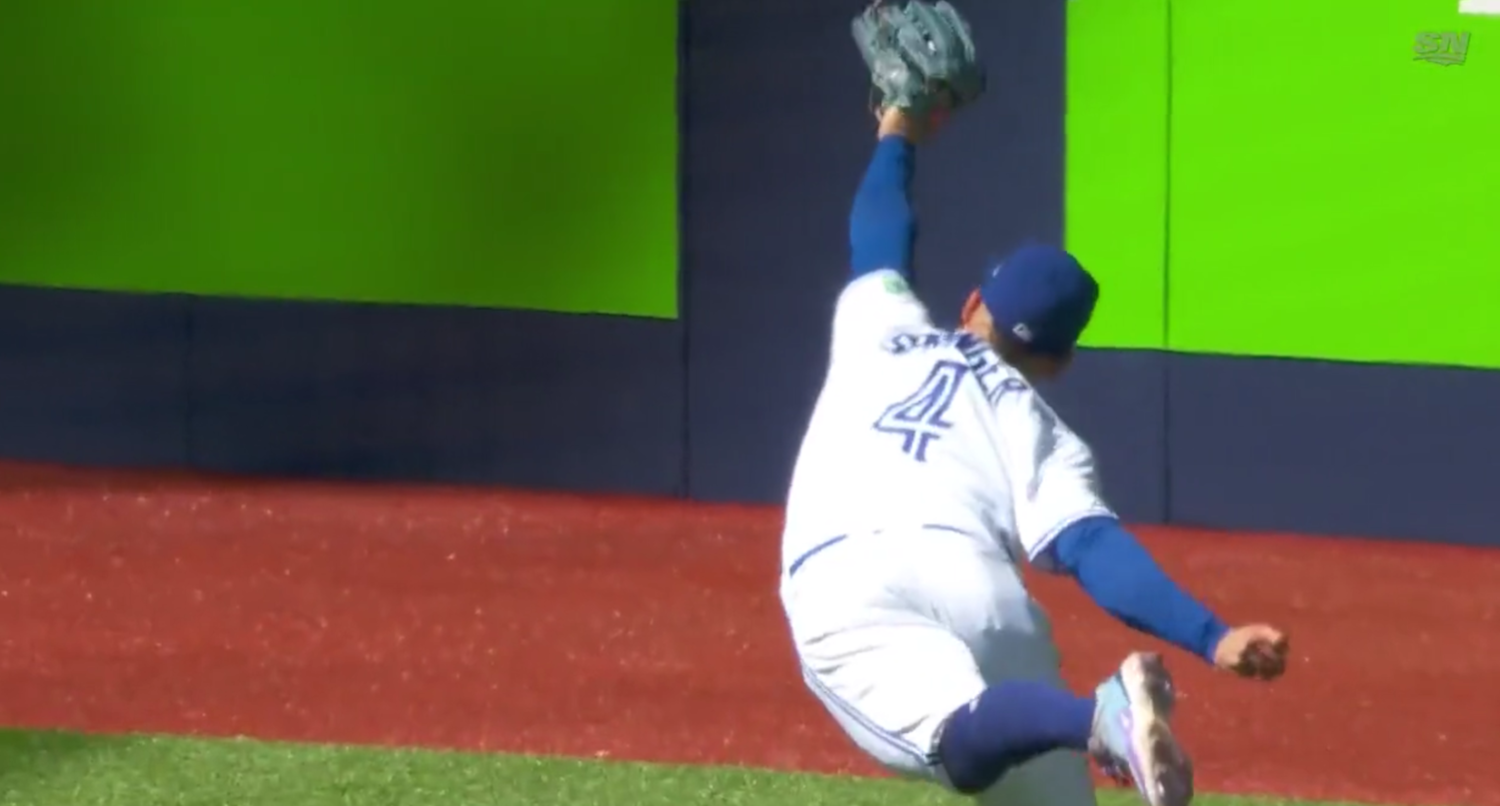 Toronto Blue Jays' outfielder George Springer makes an incredible diving catch on Aug. 27, 2023.