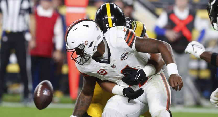 A hit by Pittsburgh Steelers linebacker Alex Highsmith (56) causes Cleveland Browns quarterback Deshaun Watson (4) to fumble