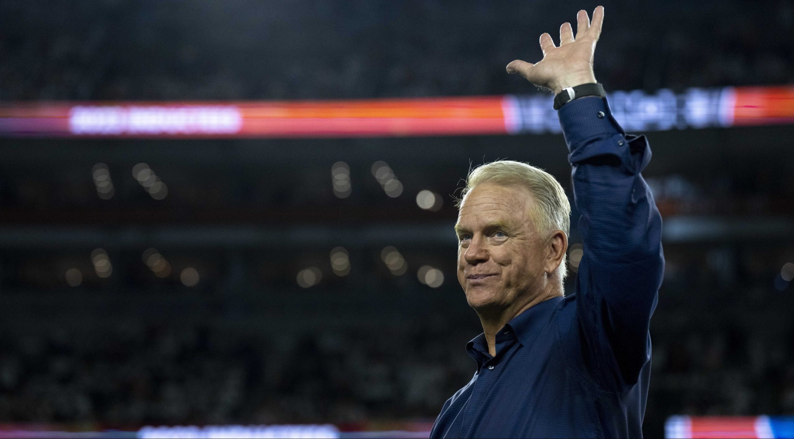 Sep 25, 2023; Cincinnati, Ohio, USA; Boomer Esiason, former Cincinnati Bengals quarterback, waives before being announced at halftime as a Bengals Ring of Champions inductee at halftime of the NFL game between the Cincinnati Bengals and Los Angeles Rams at Paycor Stadium. Mandatory Credit: Albert Cesare-USA TODAY Sports