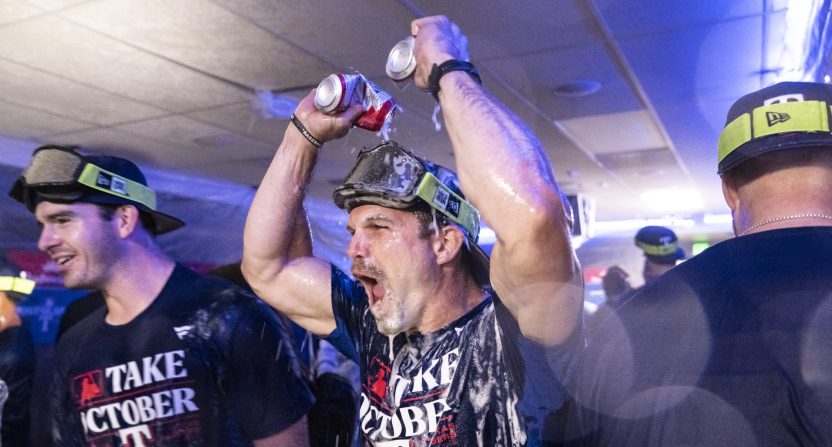 Texas Rangers celebrate in the clubhouse after clinching a post-season berth against the Seattle Mariners at T-Mobile Park