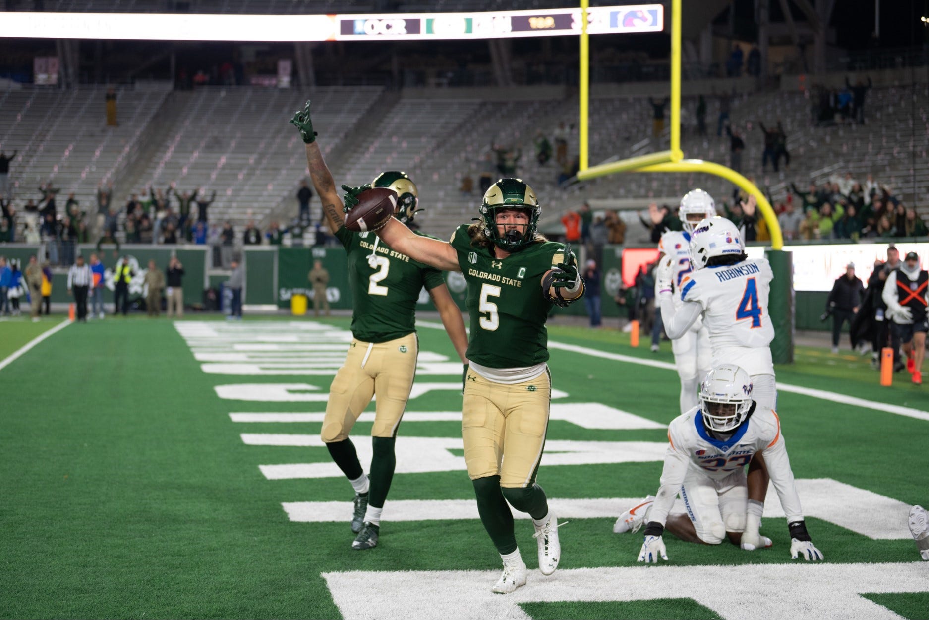 Colorado State football player Dallin Holker celebrates the game-winning catch on a Hail Mary to beat Boise State on Saturday, Oct. 14, 2023.