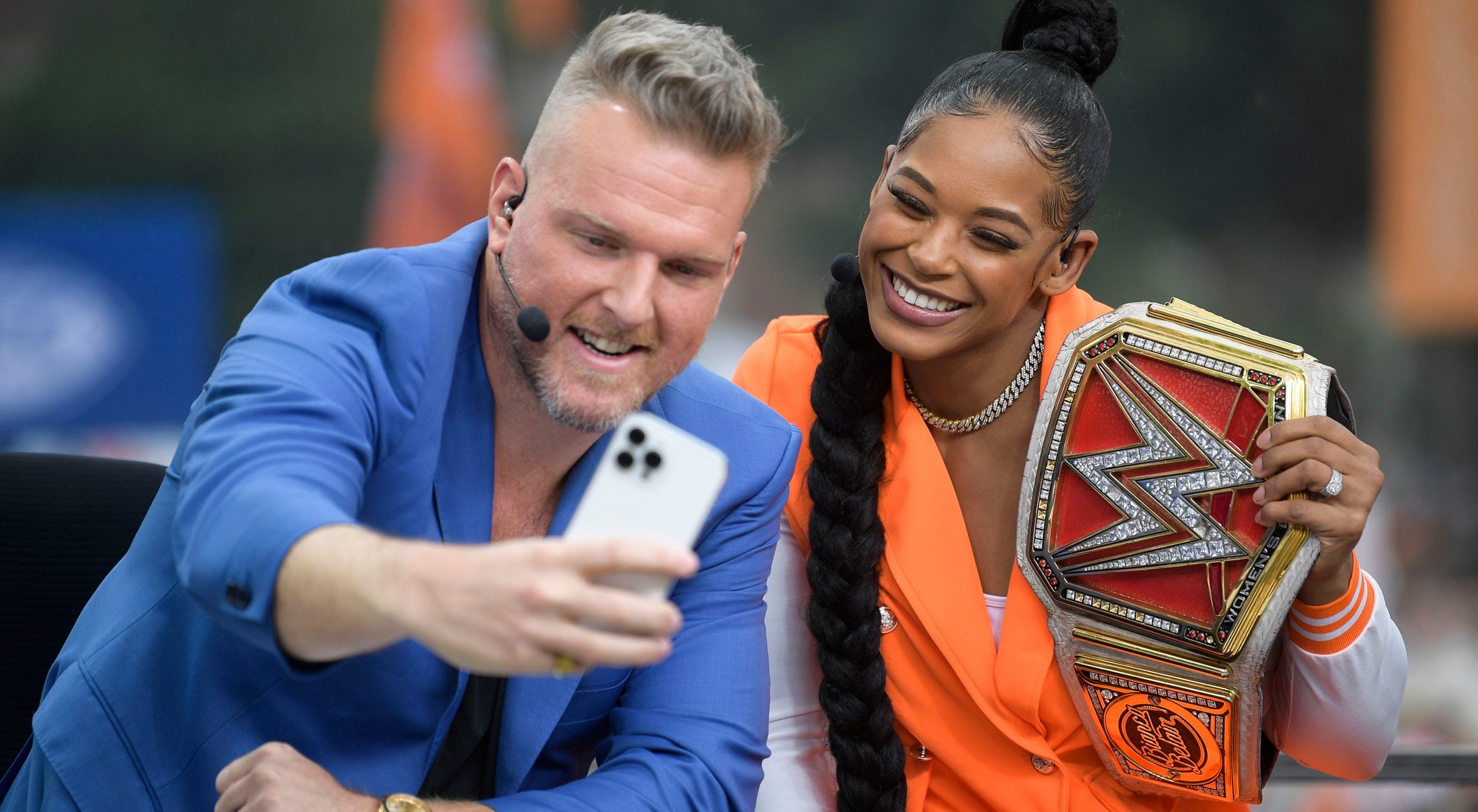 Pat McAfee and Bianca Belair take a selfie photo together at the ESPN College GameDay stage outside of Ayres Hall on the University of Tennessee campus in Knoxville, Tenn. on Saturday, Sept. 24, 2022. The flagship ESPN college football pregame show returned for the tenth time to Knoxville as the No. 12 Vols hosted the No. 22 Gators.