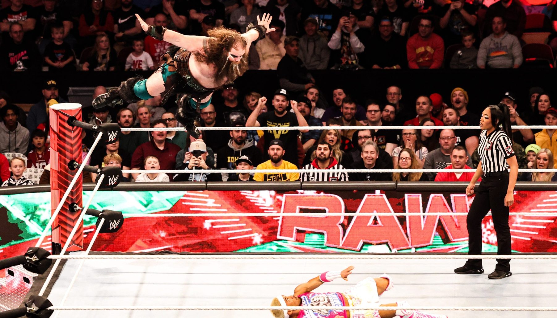 Ivar leaps off the top rope on top of Akira Tozawa during "WWE Monday Night Raw" at Wells Fargo Arena in Des Moines.