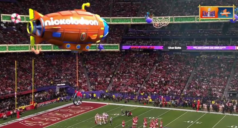 Nate Burleson dangles from the Nickelodeon blimp.