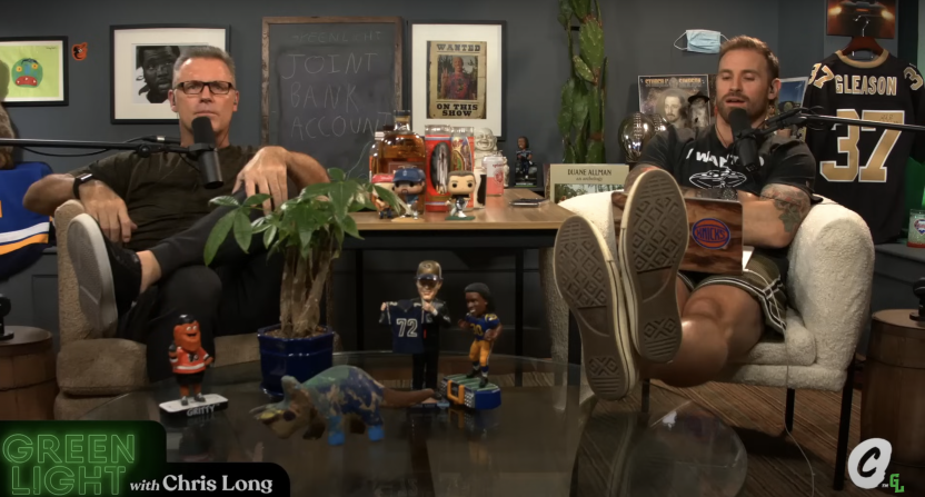 Howie Long (left) and Chris Long (right) during a recording of the "Green Light with Chris Long" podcast.