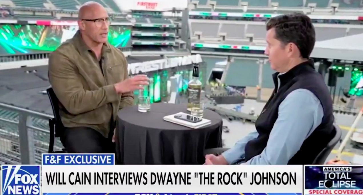 Dwayne Johnson and Will Cain on Fox & Friends Photo Credit: Fox News