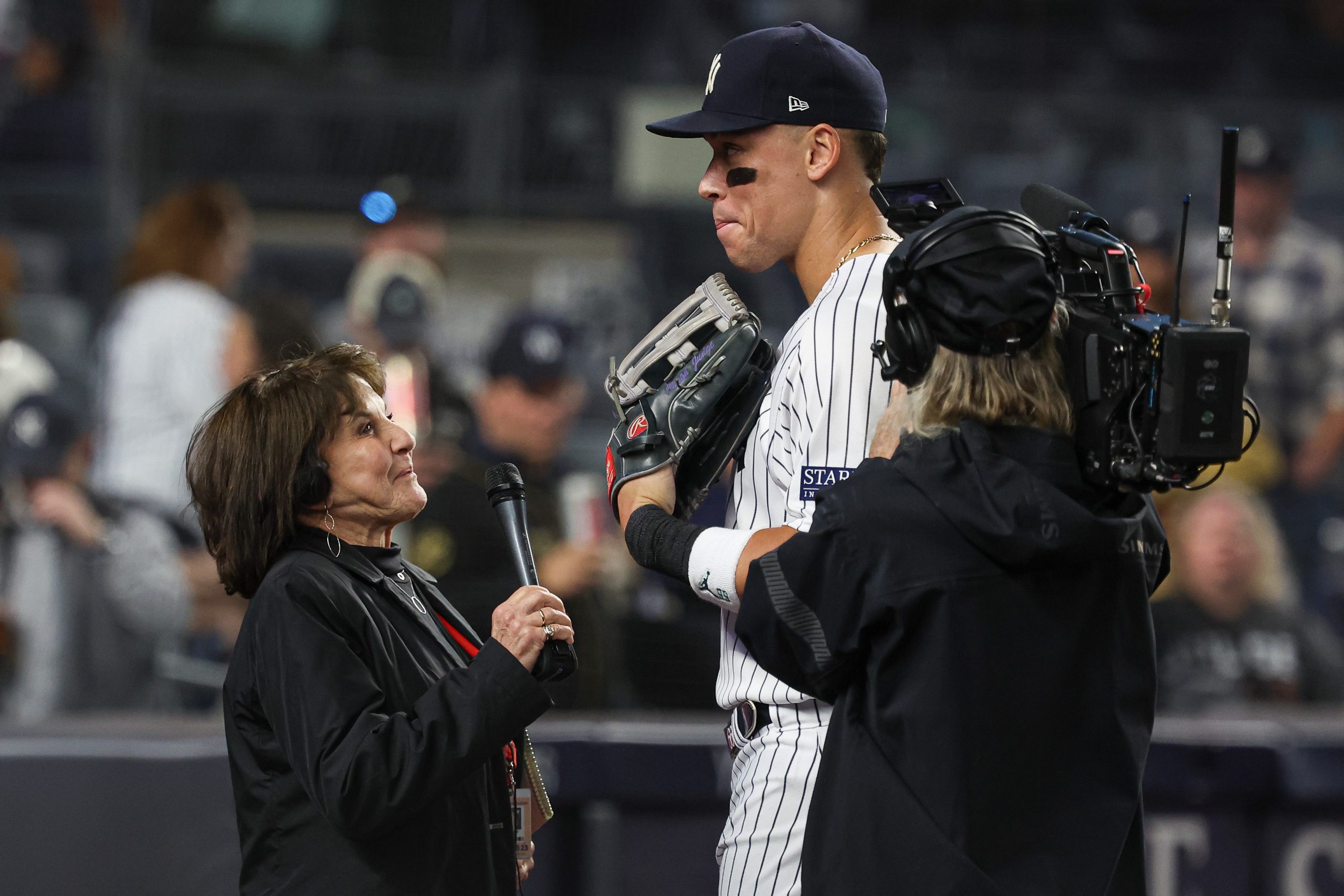 Sep 22, 2023; Bronx, New York, USA; New York Yankees right fielder Aaron Judge (99) is interviewed by Yankees radio announcer Suzyn Waldman after the game against the Arizona Diamondbacks at Yankee Stadium.