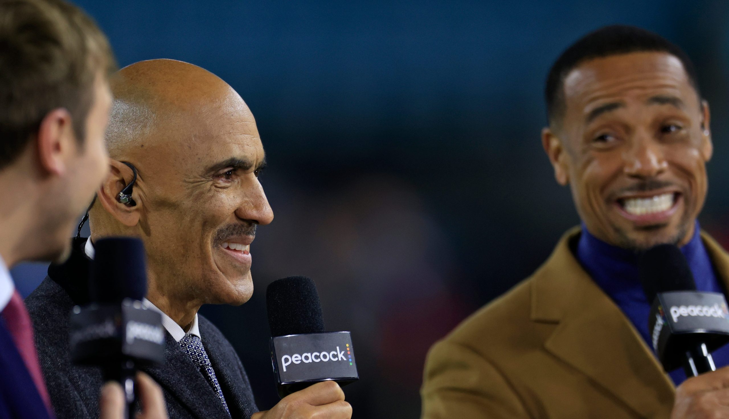 Commentators, from left, Jac Collinsworth, Tony Dungy and Rodney Harrison talk on-air for NBC/Peacock Sunday Night Football after the game of a regular season NFL football matchup Sunday, Dec. 17, 2023 at EverBank Stadium in Jacksonville, Fla. The Baltimore Ravens defeated the Jacksonville Jaguars 23-7.