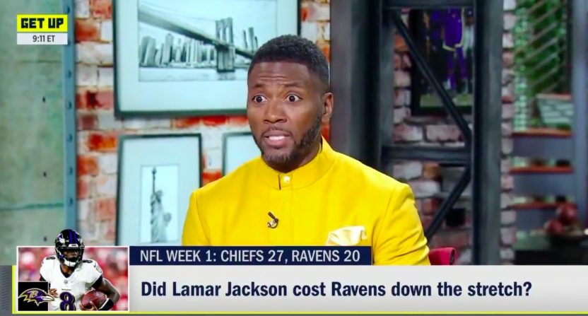 Ryan Clark wearing yellow suit