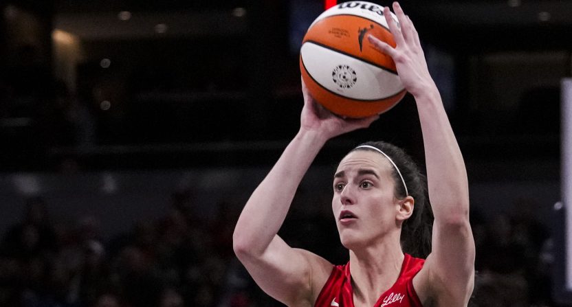 Sep 8, 2024; Indianapolis, Indiana, USA; Indiana Fever guard Caitlin Clark (22) shoots a 3-pointer Sunday, Sept. 8, 2024, during a game between the Indiana Fever and the Atlanta Dream at Gainbridge Fieldhouse. Mandatory Credit: Grace Smith/USA TODAY Network via Imagn Images