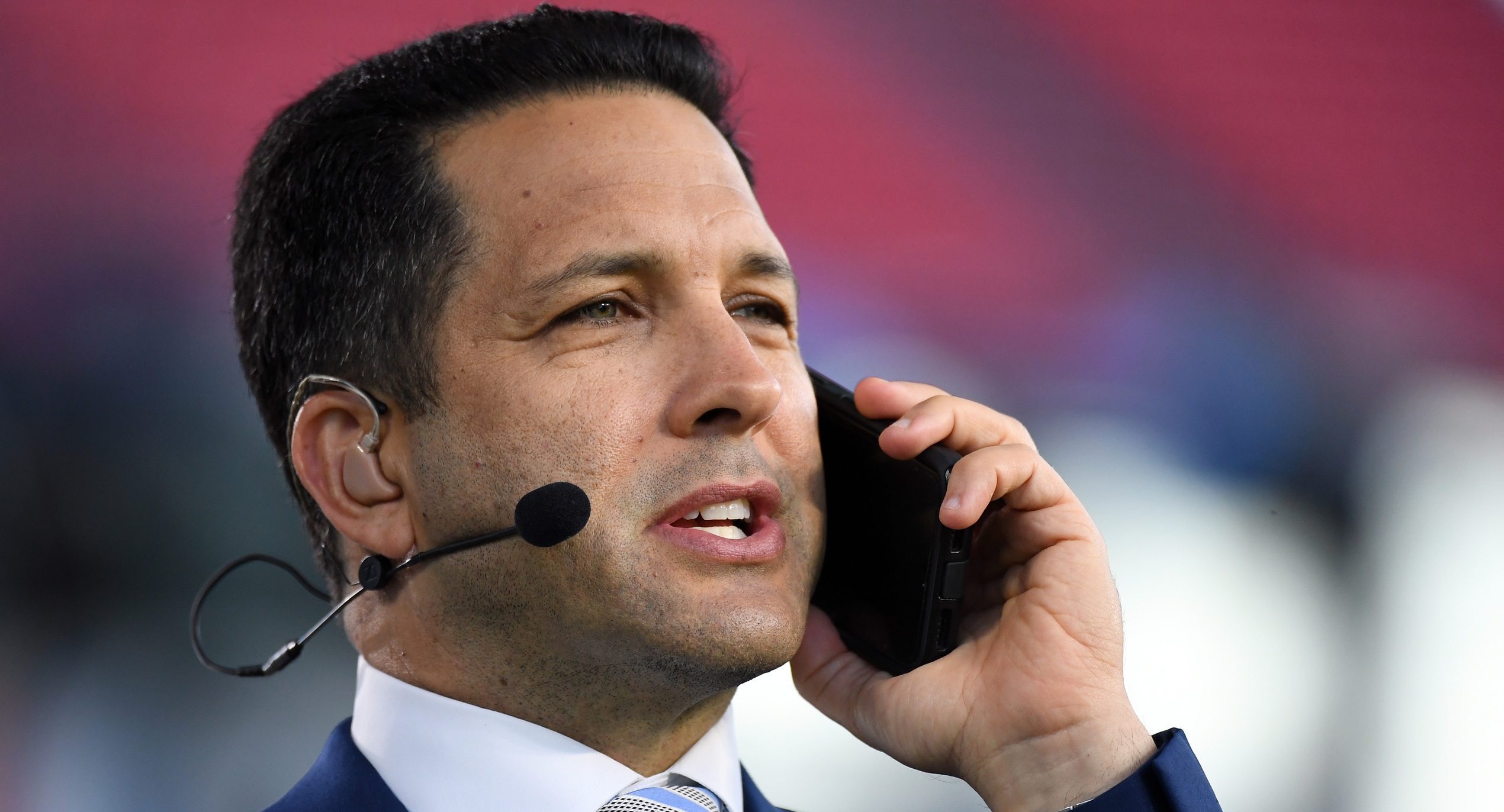 Oct 18, 2021; Nashville, Tennessee, USA; ESPN NFL Insider Adam Schefter talks on his phone before the Monday Night Football game between the Tennessee Titans and the Buffalo Bills at Nissan Stadium. Mandatory Credit: Christopher Hanewinckel-USA TODAY Sports